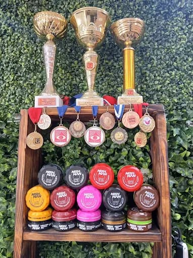 Miloš Živković barbering trophies and competition medals